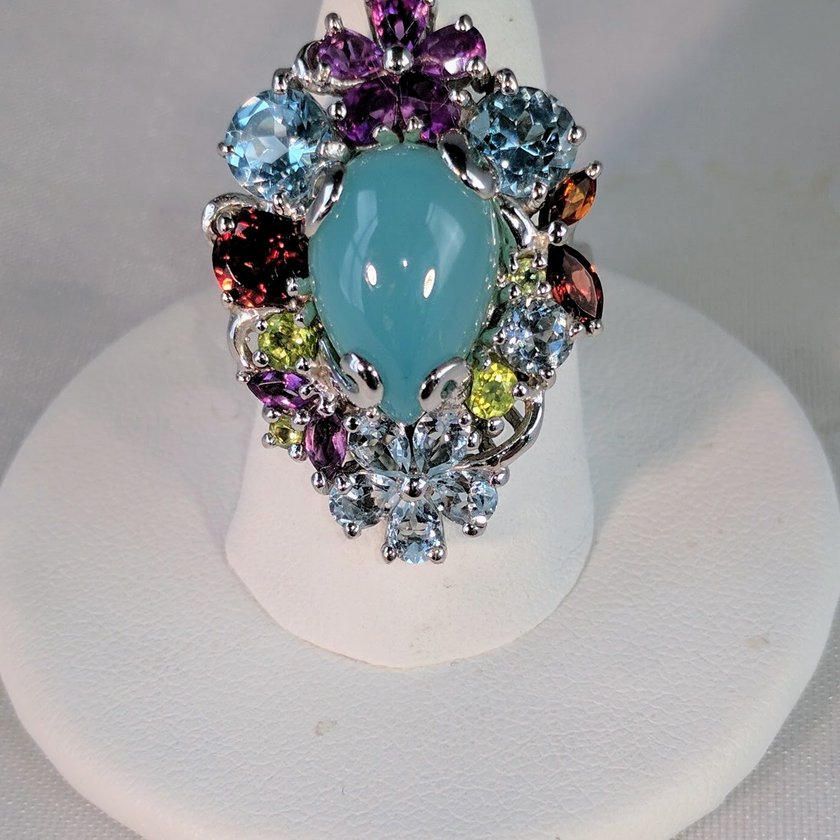 Chalcedony Surrounded by Multi Color Gems