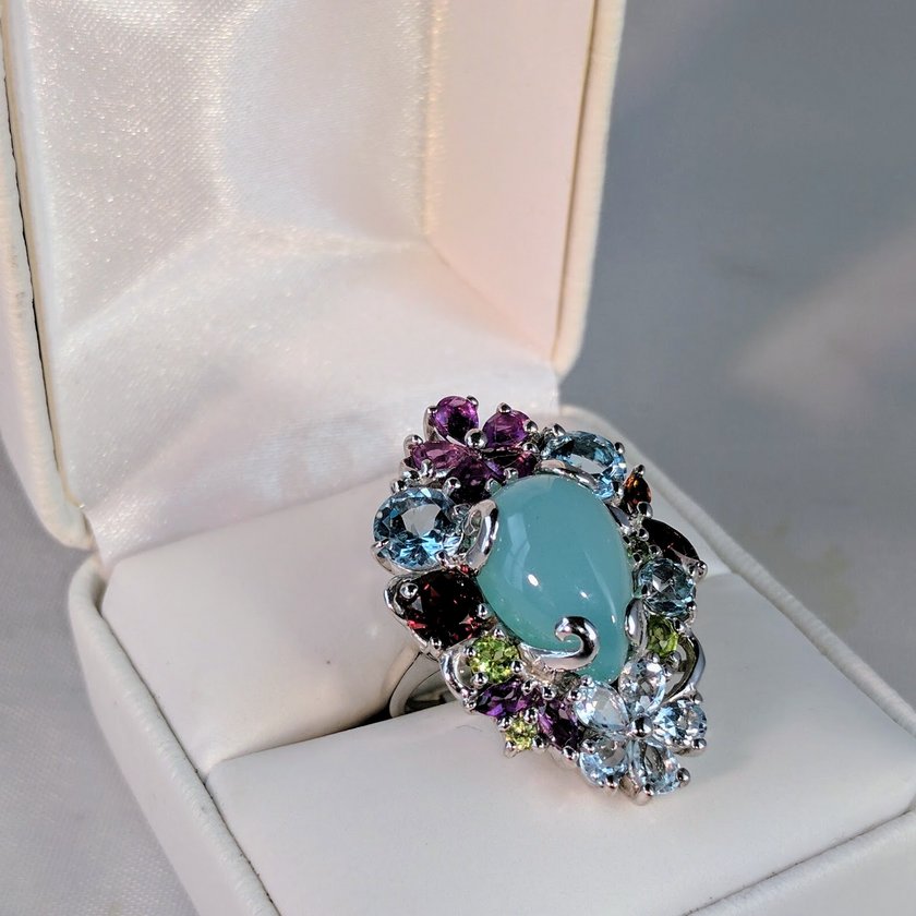 Chalcedony Surrounded by Multi Color Gems